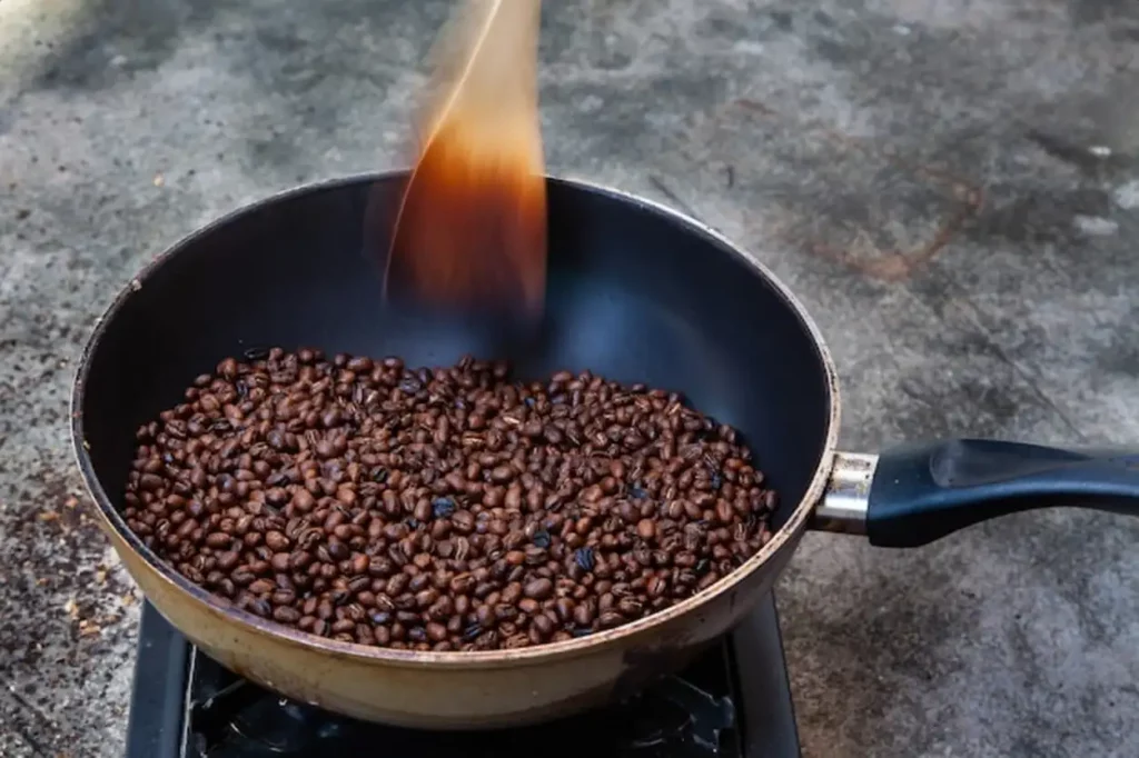 Traditional roasting coffee at home, freshly roasted coffee beans.