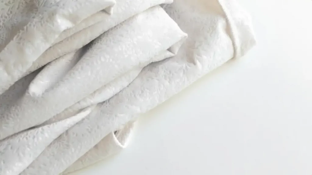 minimalistic white crumpled fabric with pattern