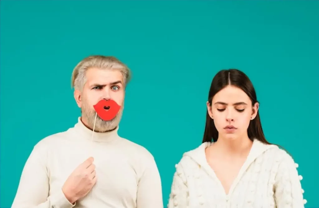 Gender concept Tolerance and gender identity concept Female and male sex icon Funny couple of woman with moustache and man with red lips