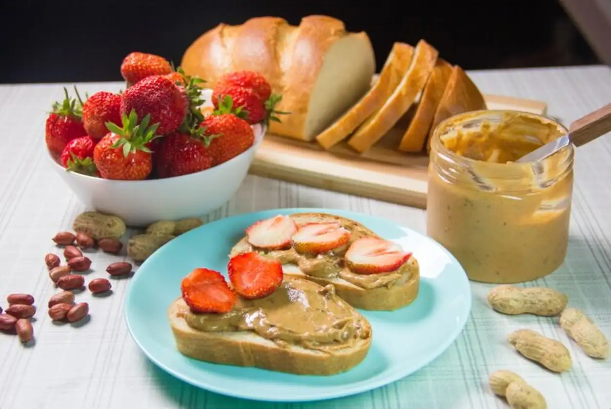 Peanut butter and strawberry sandwiches. Peanut butter and strawberry jelly sandwich