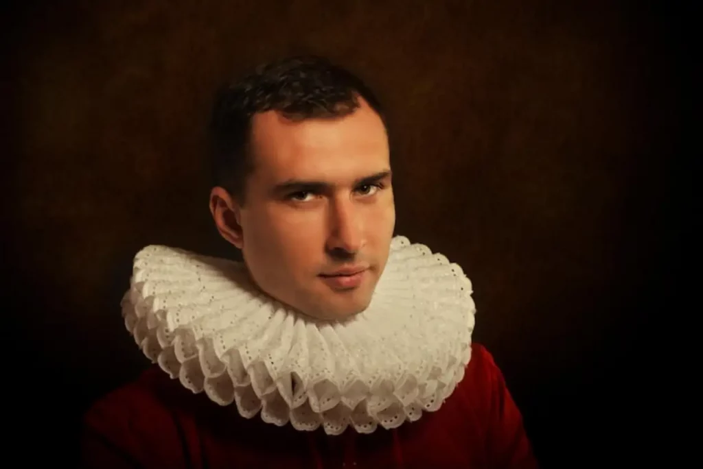Antique style portrait of a man in ruff collar