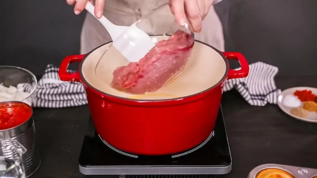 Step by step. Cooking turkey chili in enameled cast iron covered dutch oven.