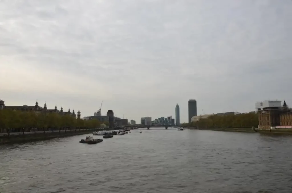 River in city against sky