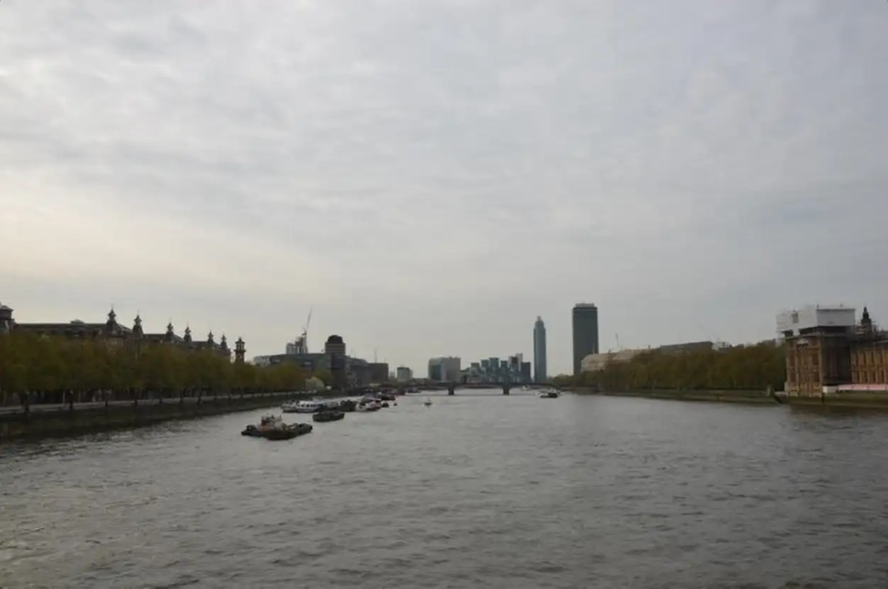 River in city against sky