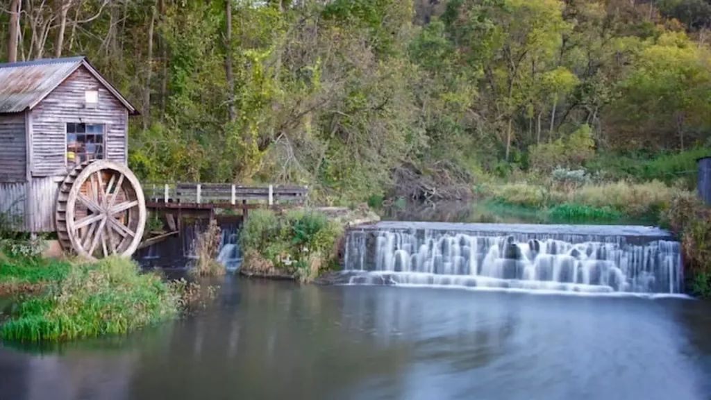 A wooden water wheel mill located in rural wisconsin mill creek
