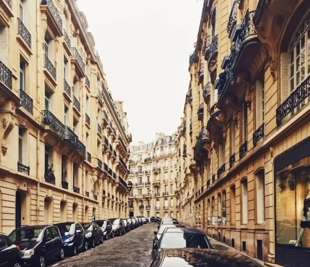 Parisian architecture and historical buildings restaurants and boutique stores on streets of Paris France