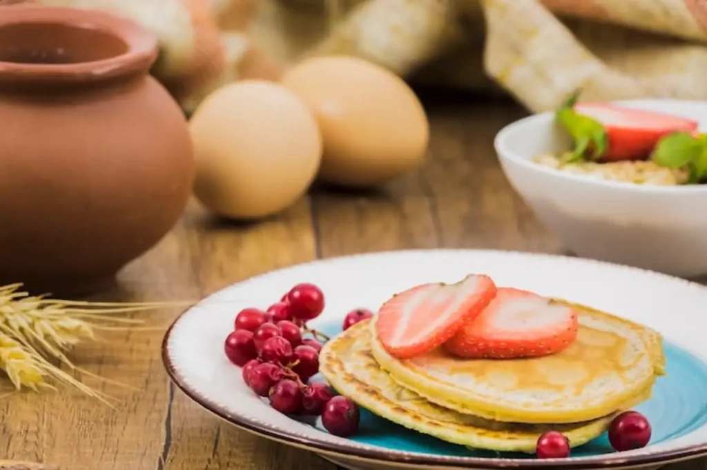 Breakfast with pancakes and strawberries