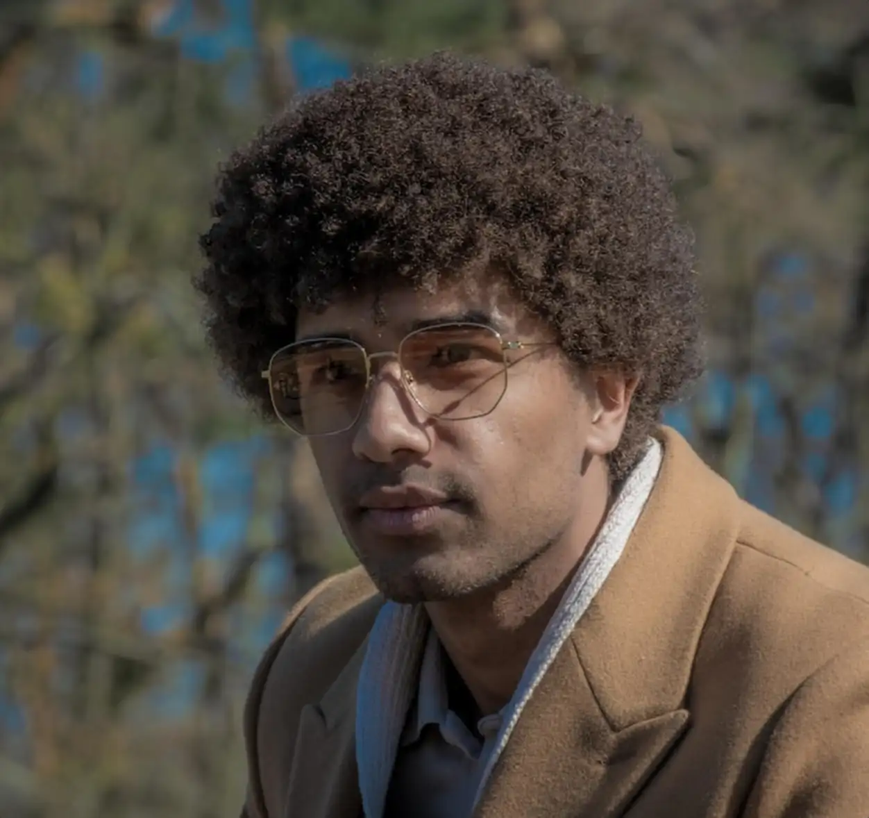 Portrait of young man outdoors