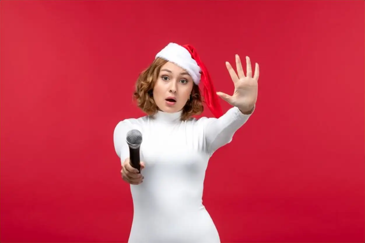 Front view of young female showing number on red